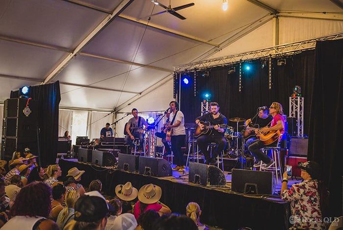 Stage-and-audience-covers-for-Country-Music-event Stage and audience covers for Country Music event